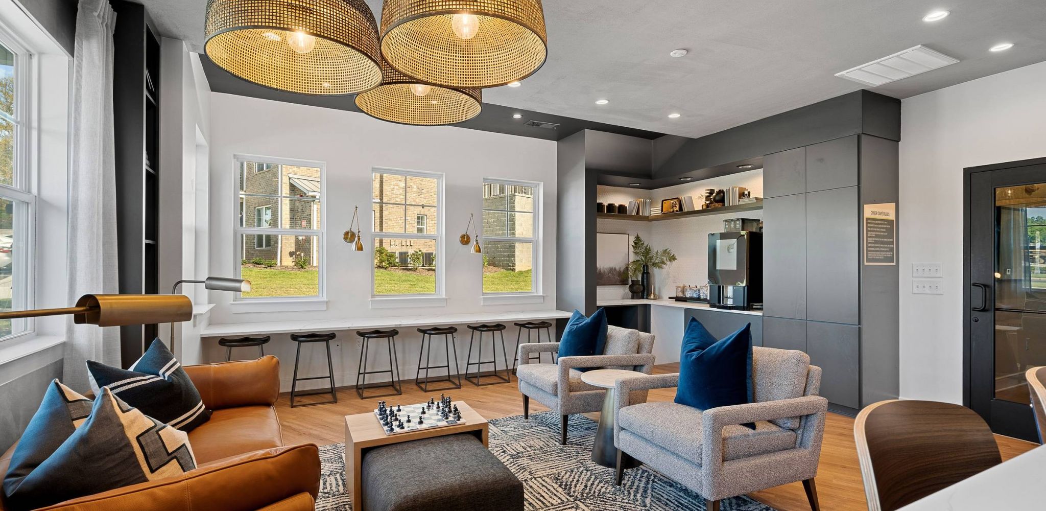 Hawthorne at the Forest resident clubhouse amenity with seating area and beautiful finishes